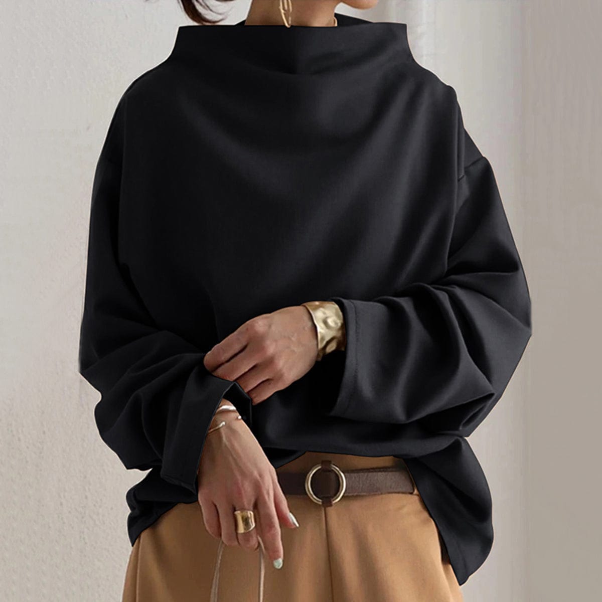 Candela | Top de Punto Suave con Cuello Alto y Corte Holgado