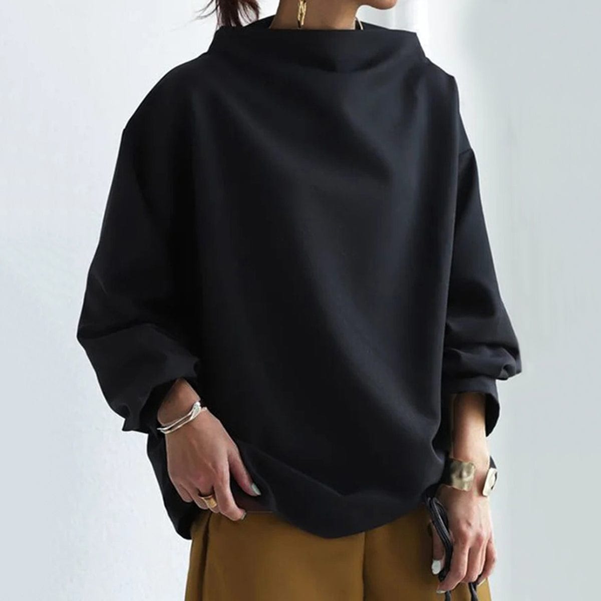 Candela | Top de Punto Suave con Cuello Alto y Corte Holgado
