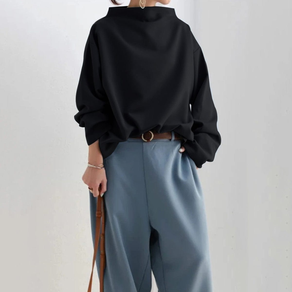 Candela | Top de Punto Suave con Cuello Alto y Corte Holgado