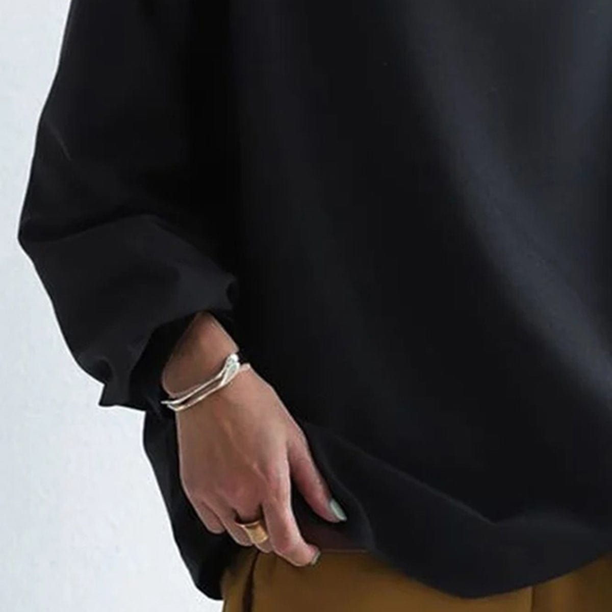 Candela | Top de Punto Suave con Cuello Alto y Corte Holgado