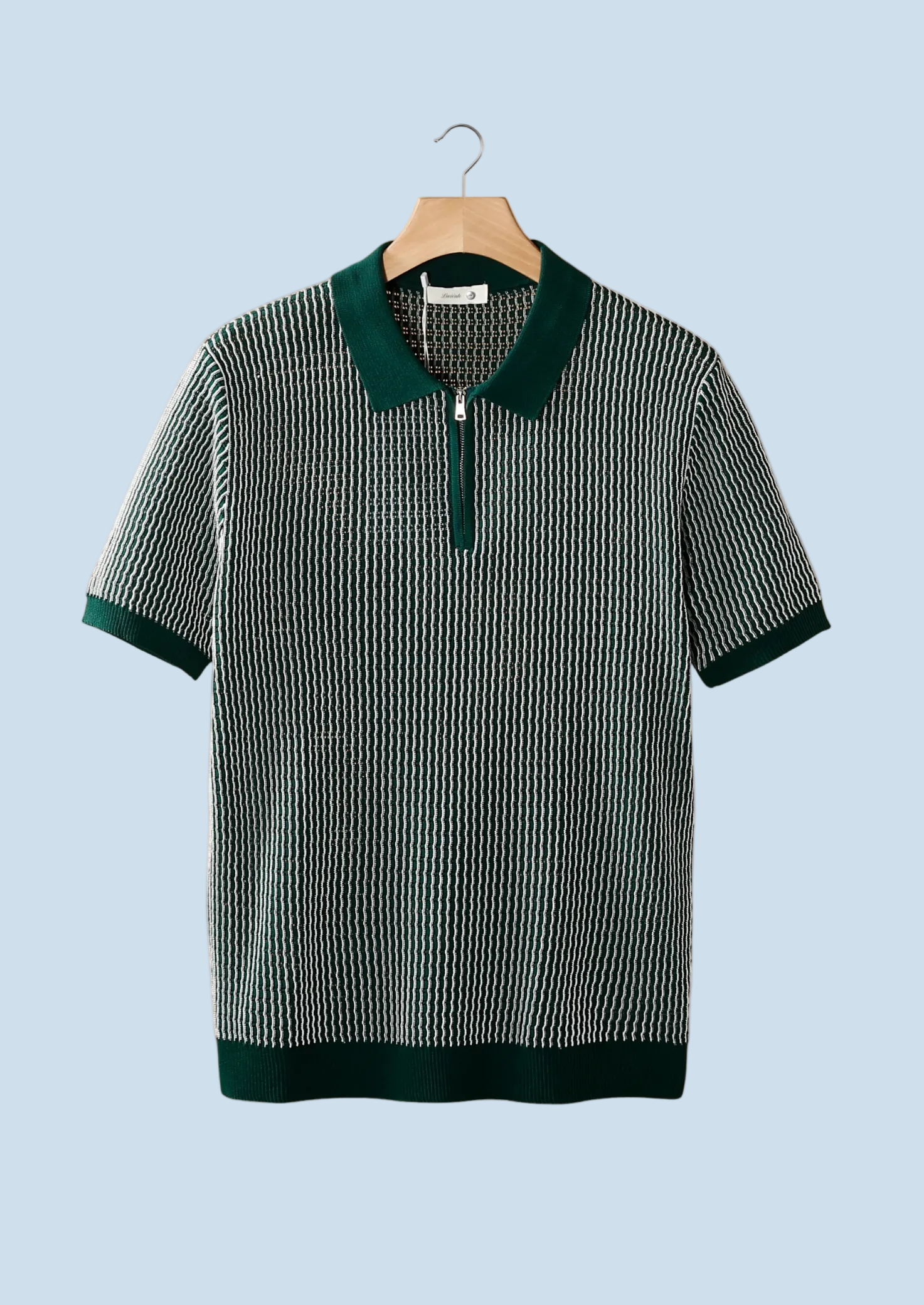 POLO CON CREMALLERA Y TEXTURA GEOMÉTRICA