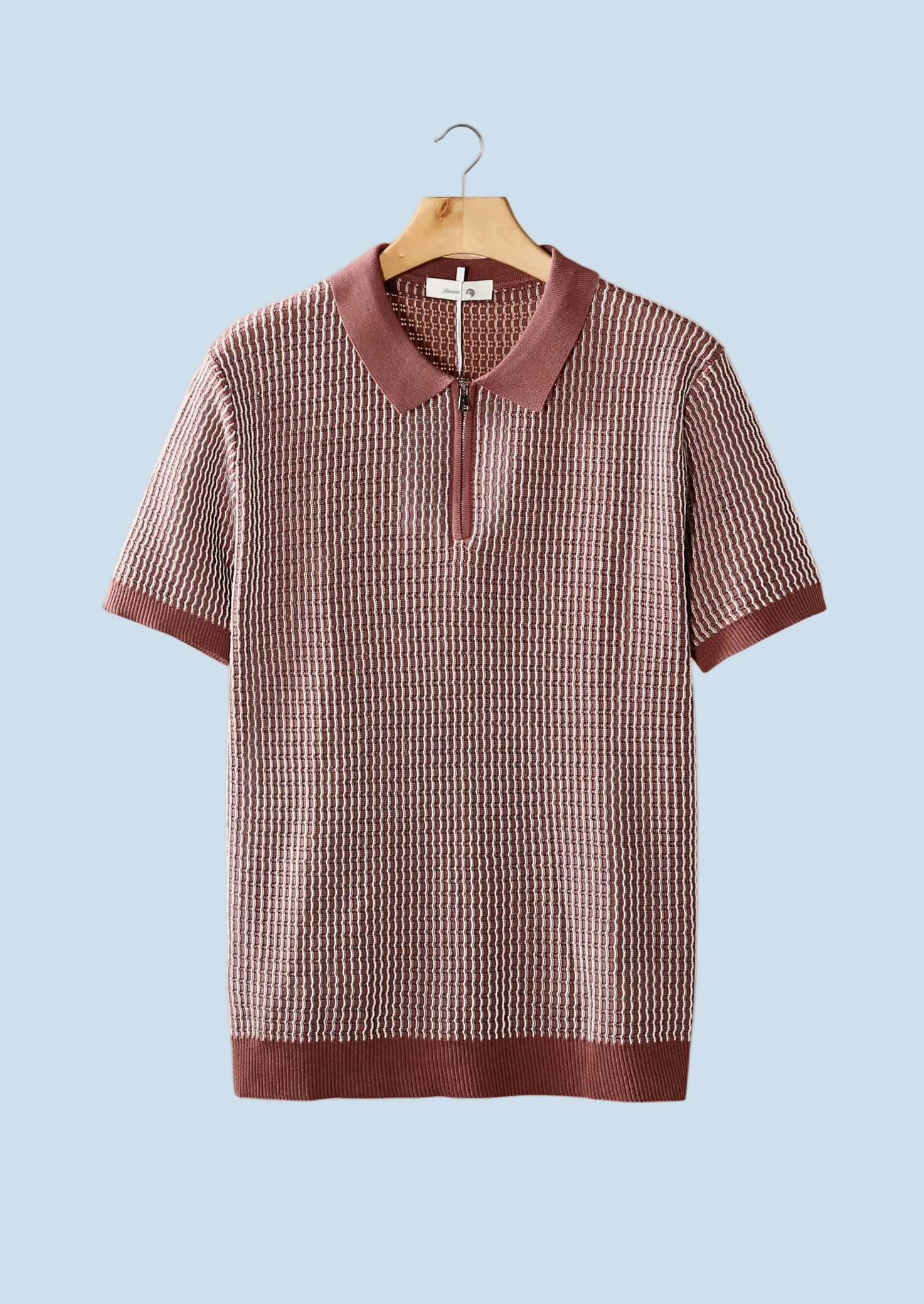 POLO CON CREMALLERA Y TEXTURA GEOMÉTRICA