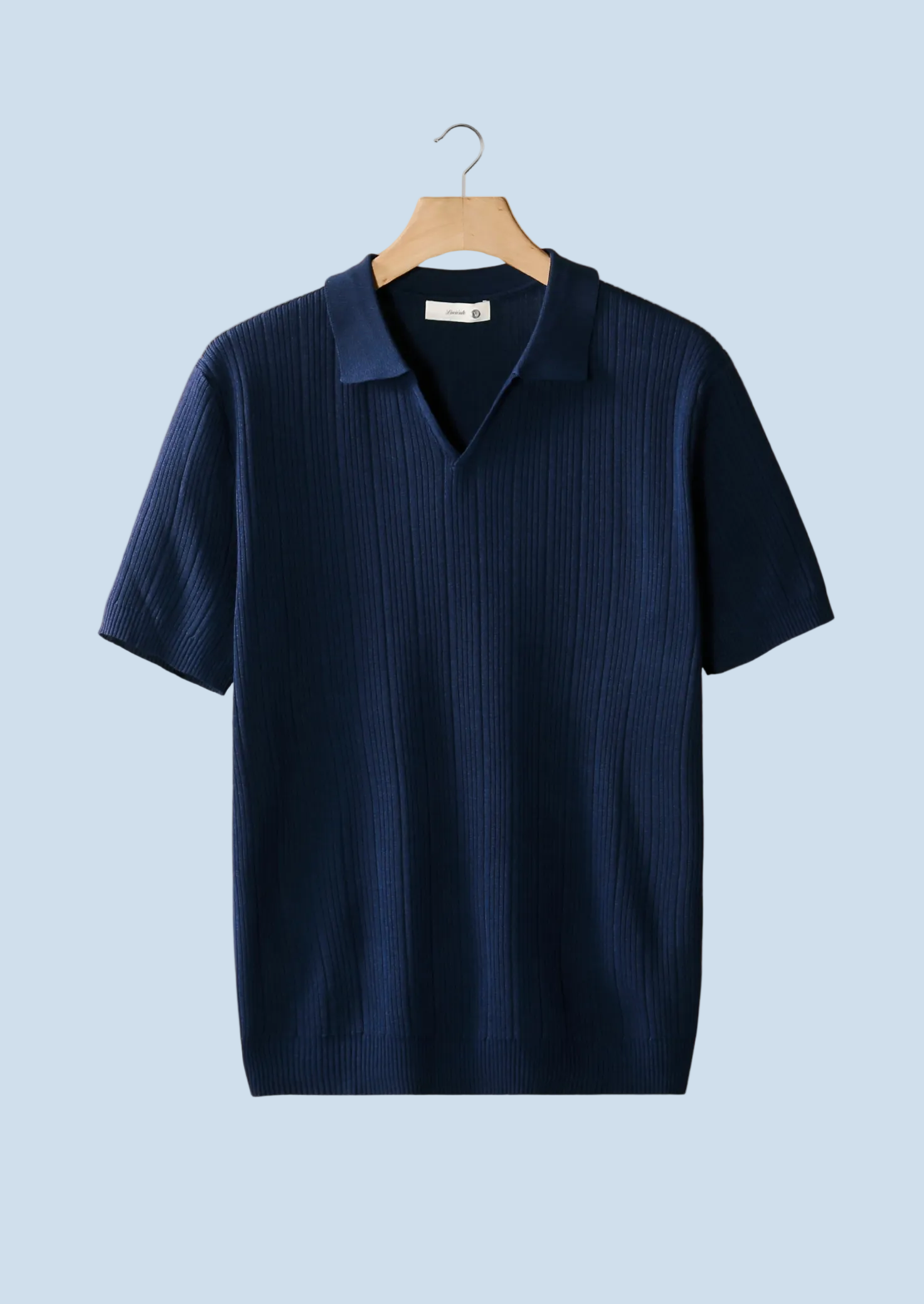 POLO DE CUELLO ABIERTO CON CUELLO DE CANELLA