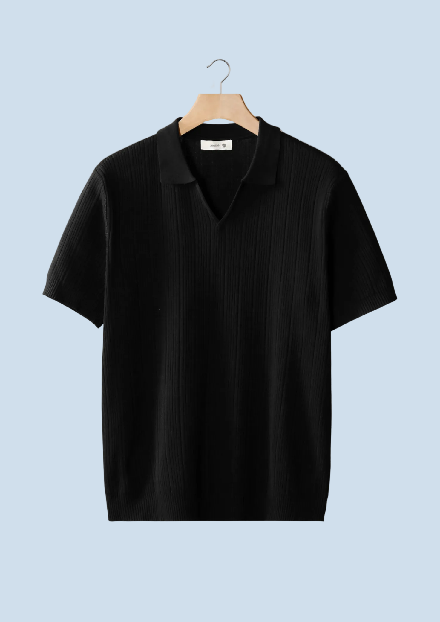 POLO DE CUELLO ABIERTO CON CUELLO DE CANELLA