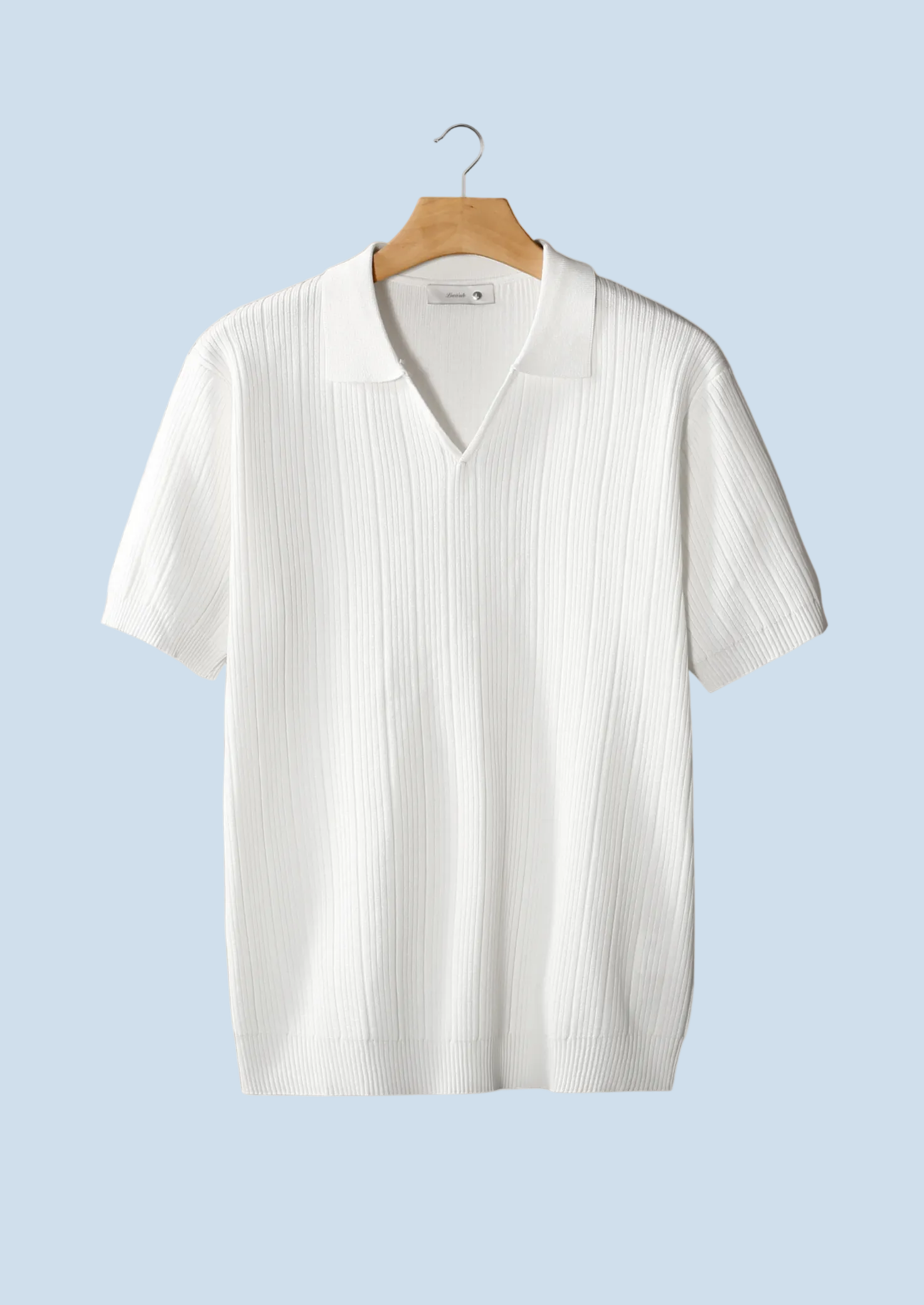 POLO DE CUELLO ABIERTO CON CUELLO DE CANELLA