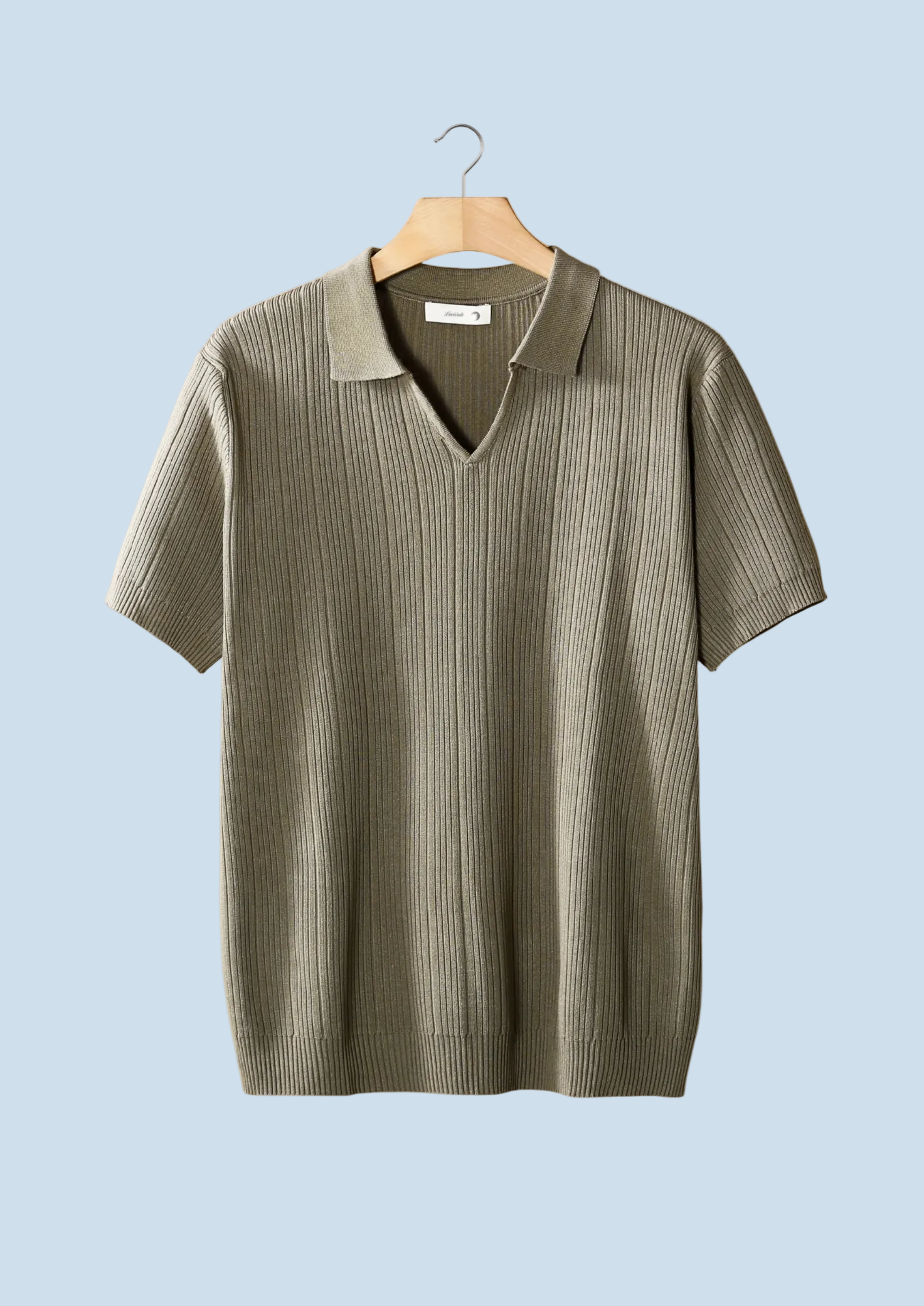 POLO DE CUELLO ABIERTO CON CUELLO DE CANELLA