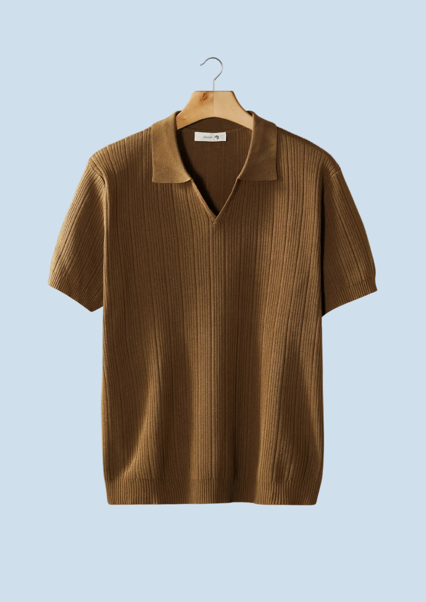POLO DE CUELLO ABIERTO CON CUELLO DE CANELLA
